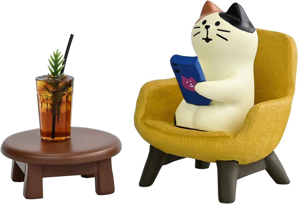 Cute cat figurine playing phone on sofa with coffee, cat lovers gift for home decor
